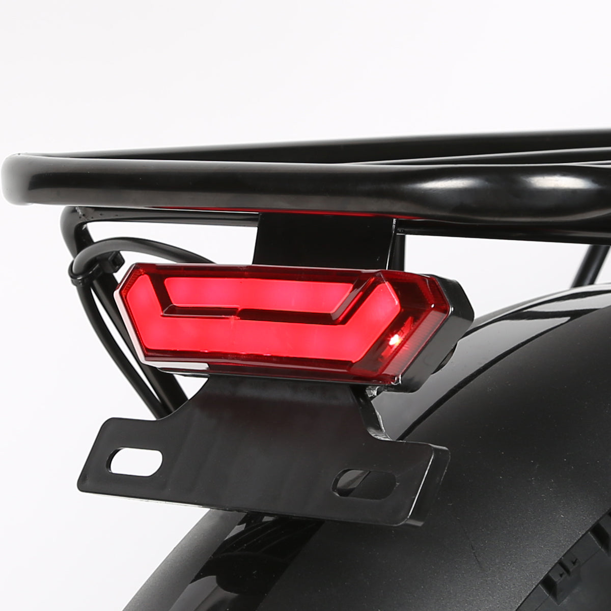 Attach bags, baskets, or simply strap on bulky items - the heavy-duty rack makes hauling a cinch. The red tail light makes the night/dusk ride more peace of mind.